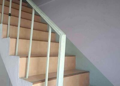 Indoor staircase with handrail