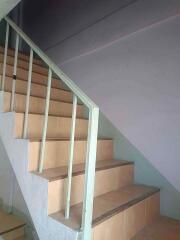 Indoor staircase with handrail