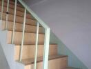 Indoor staircase with handrail