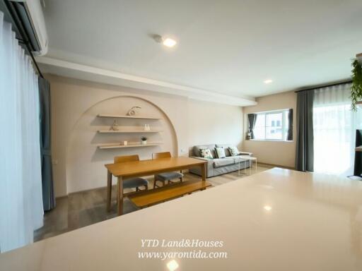 spacious living room with dining area