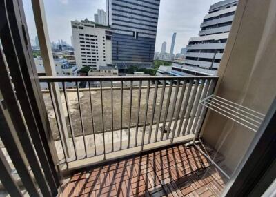 Balcony view of cityscape with high-rise buildings