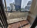 Balcony view of cityscape with high-rise buildings