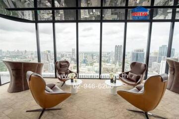 Spacious living area with panoramic city view