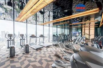 Modern gym with a panoramic city view