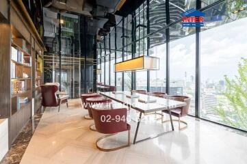 Modern dining room with large windows and city view