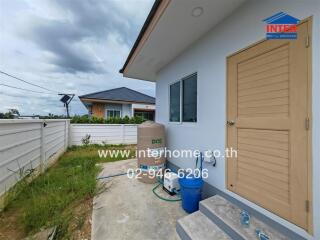 House exterior with stairs and door