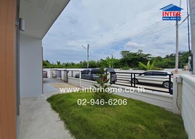 House exterior with driveway and garden