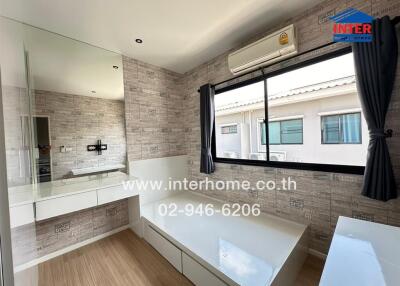 Bathroom with vanity mirror and storage space