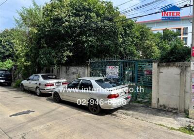 Front view of property with car parking space and greenery