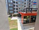 View of apartment building's exterior with balconies