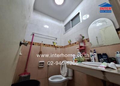 Clean and well-maintained bathroom with essential amenities