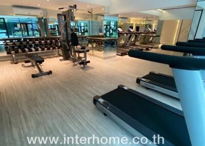 Spacious gym with modern equipment