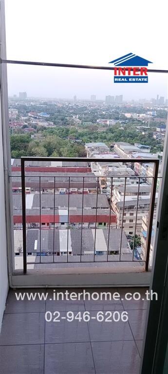 Balcony with railing and city view