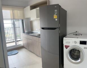 Modern kitchen with balcony access