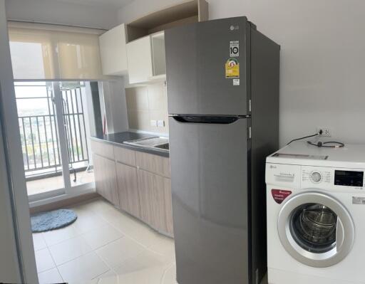 Modern kitchen with balcony access