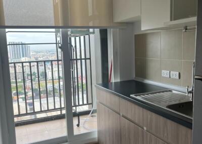 Modern kitchen with balcony view