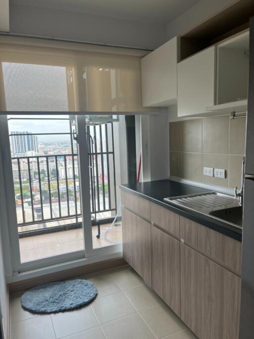 Modern kitchen with balcony view