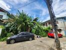 Cars parked outside residential buildings