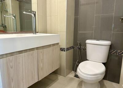 Modern bathroom with sink and toilet