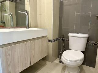 Modern bathroom with sink and toilet