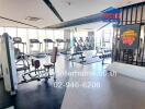 Modern gym facility with fitness equipment and motivational posters