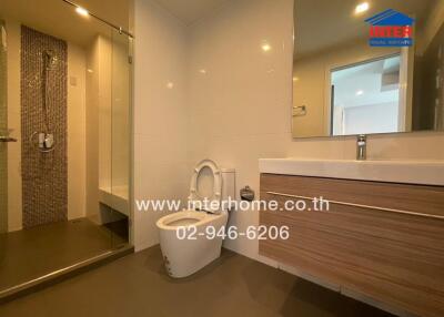 Modern bathroom with shower and vanity