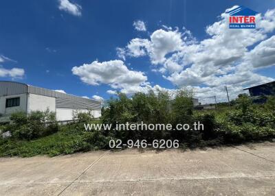 Vacant land with clear blue sky