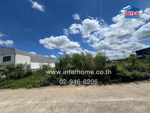 Vacant land with clear blue sky