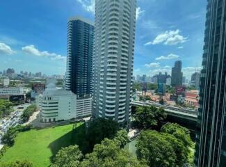 View of city skyline with tall residential and office buildings