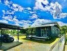 Exterior view of a house with a carport and driveway