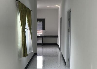 Bright and clean hallway with marble flooring