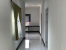 Bright and clean hallway with marble flooring