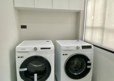 Laundry room with washer and dryer