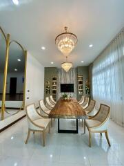 Luxury dining room with elegant chandelier and modern furniture