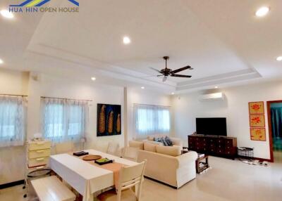 Spacious living room with dining area