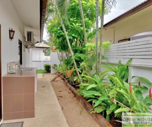 Outdoor corridor with greenery