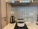 Modern kitchen with appliances and cooking utensils