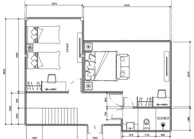 Second floor plan showing bedrooms, bathroom, and staircase