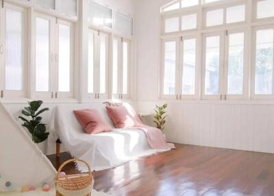 Bright living room with large windows and natural light