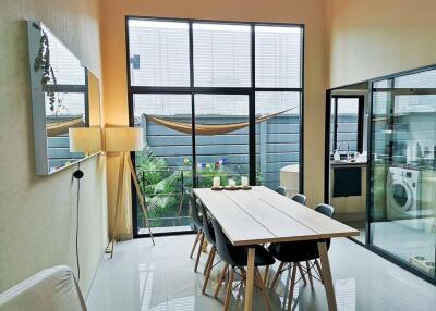 modern dining area with large windows