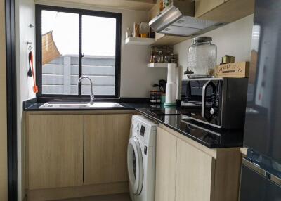 Modern kitchen with appliances and window