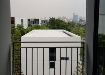 View from balcony showing neighboring buildings