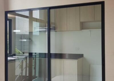 Modern kitchen with glass partition