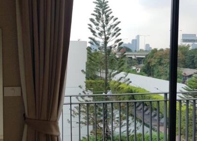 Balcony with a view of the cityscape