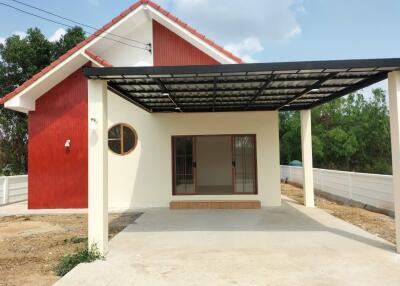 Front view of a house with a carport