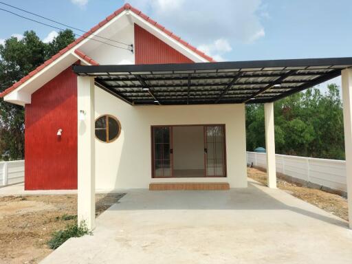 Front view of a house with a carport