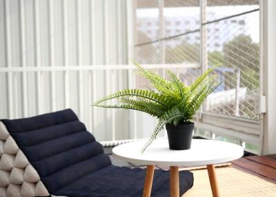 Cozy balcony with seating and table