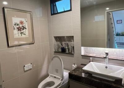 Modern bathroom with toilet and sink