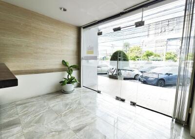 Modern building entrance with large glass doors