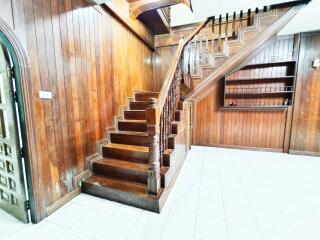 Main hallway with wooden staircase